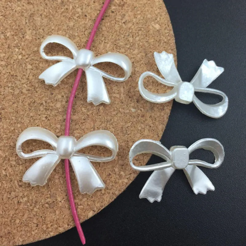 

Искусственный жемчуг в форме банта из АБС-пластика, 27 х17 мм, 200 шт.