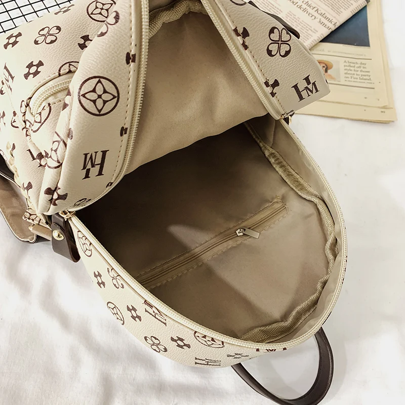

European and American style Small Backpack Classic Flower Backpack Cute Rivet Leisure Backpack Designer Luxurious Female Bag