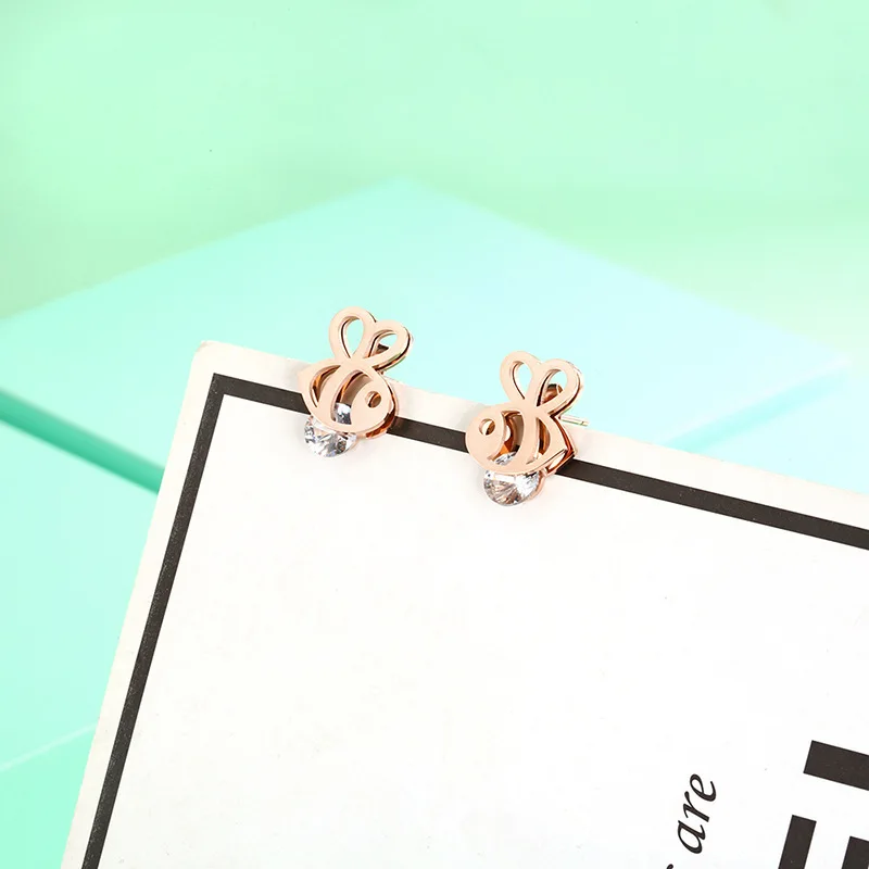 Женские серьги гвоздики из нержавеющей стали с рыбками золотые розового золота