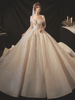 luxury champagne 2021 new wedding dress with sweep train shining sequins custom made ball gown elegant boat neck ball gown