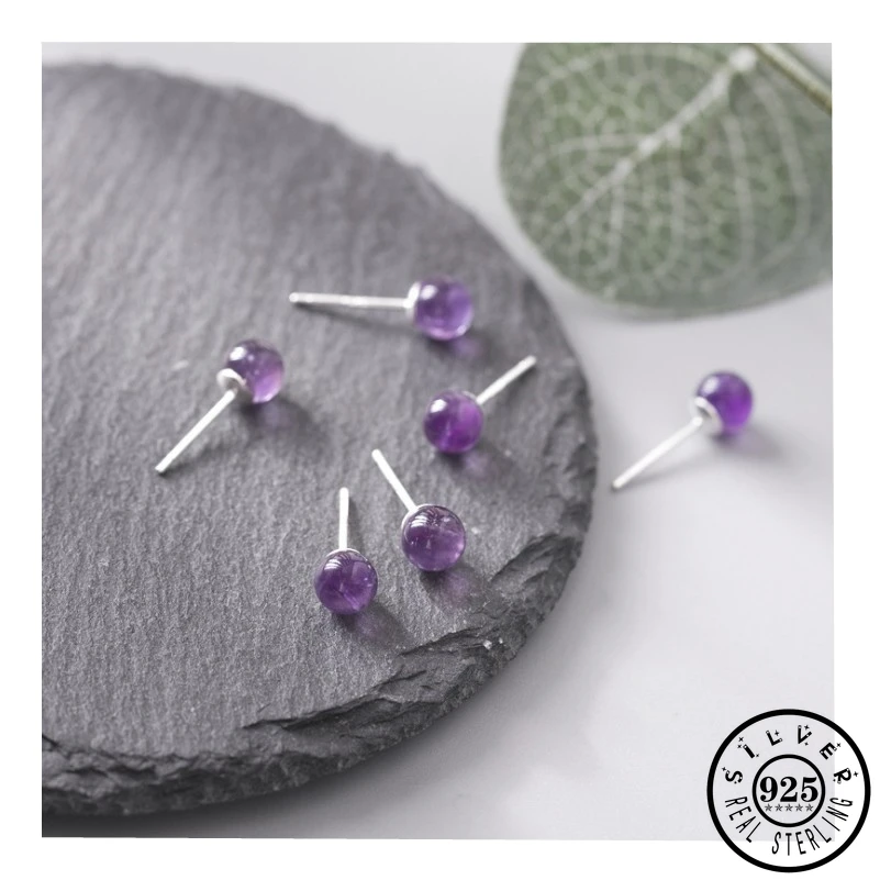 Женские серьги-гвоздики из серебра 100% пробы с фиолетовыми кристаллами |