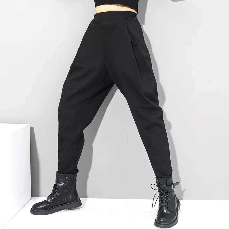 

Брюки универсальные Свободные повседневные штаны-шаровары с эластичной резинкой на талии, маленькие ноги длинные брюки на подтяжках темно-...