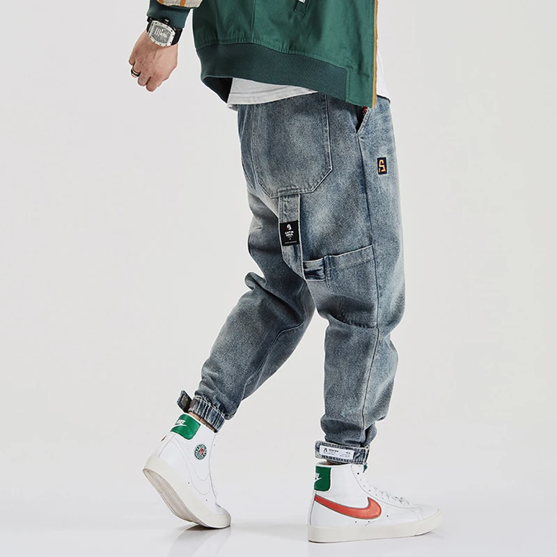 Quality American Streetwear High Fashion Men Jeans Loose Fit Multi Pockets Cargo Pants Harem Jeans Designer Hip Hop Jogger Jeans