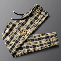 light luxury golden badge yellow woven plaid pants close up summer thin casual trousers
