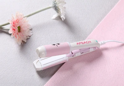 

At Fashion Small Hair Straightener Curling irons Electric Easy hair styling tools Portable Carton Mini hair curler with PVC Box