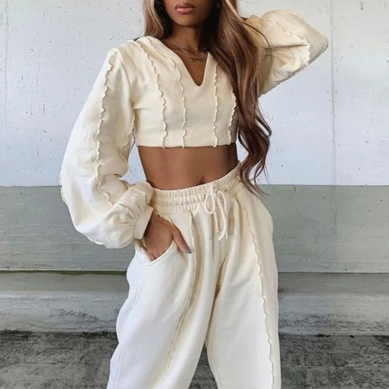 

Женский спортивный костюм, укороченный топ с V-образным вырезом, пуловеры с длинными рукавами-фонариками и рюшами, спортивные штаны на шнуро...