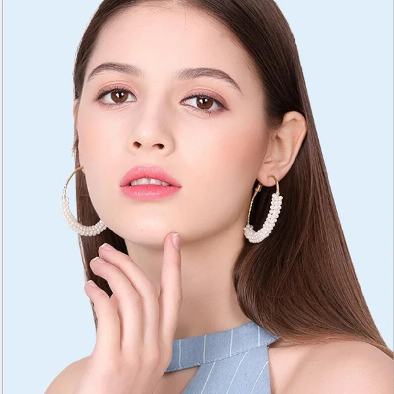 

Женские серьги-гвоздики с искусственным жемчугом