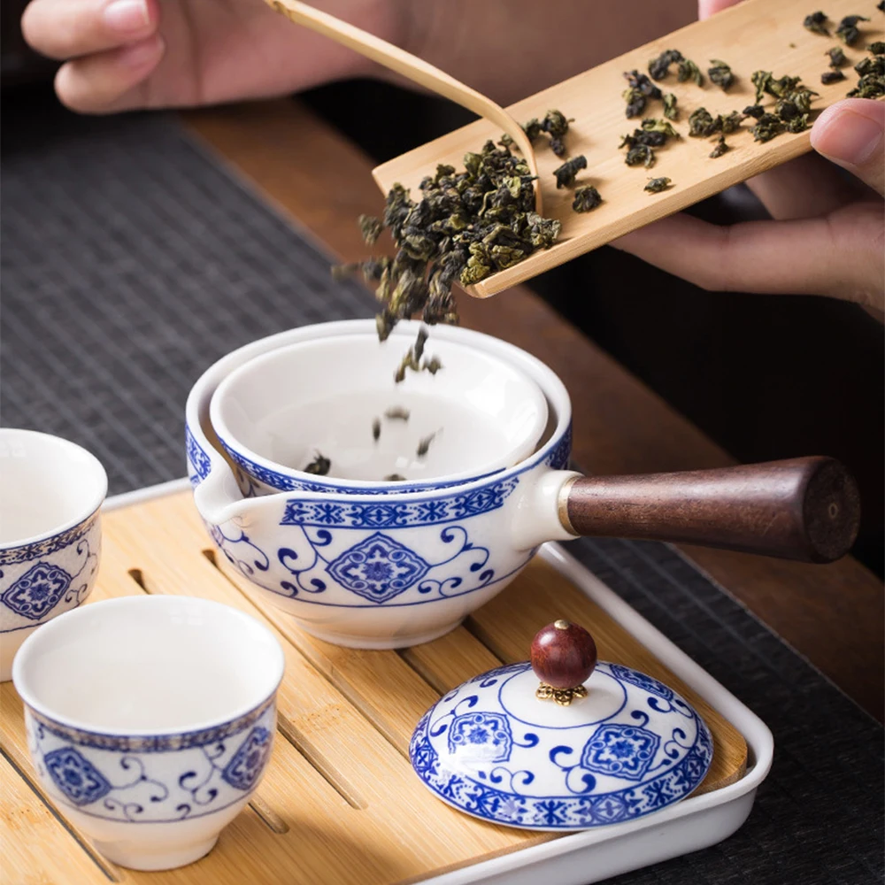 

Ceramic Teaware Teapot With 4 Tea Cups Pu Er Tea Pot Household Kung Fu Oolong Filter Tea Maker Creative Black Pottery Teaware