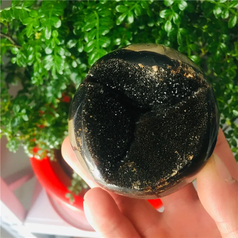 

6.5-7cm natural quartz baccalcitrine spherical cavity + base