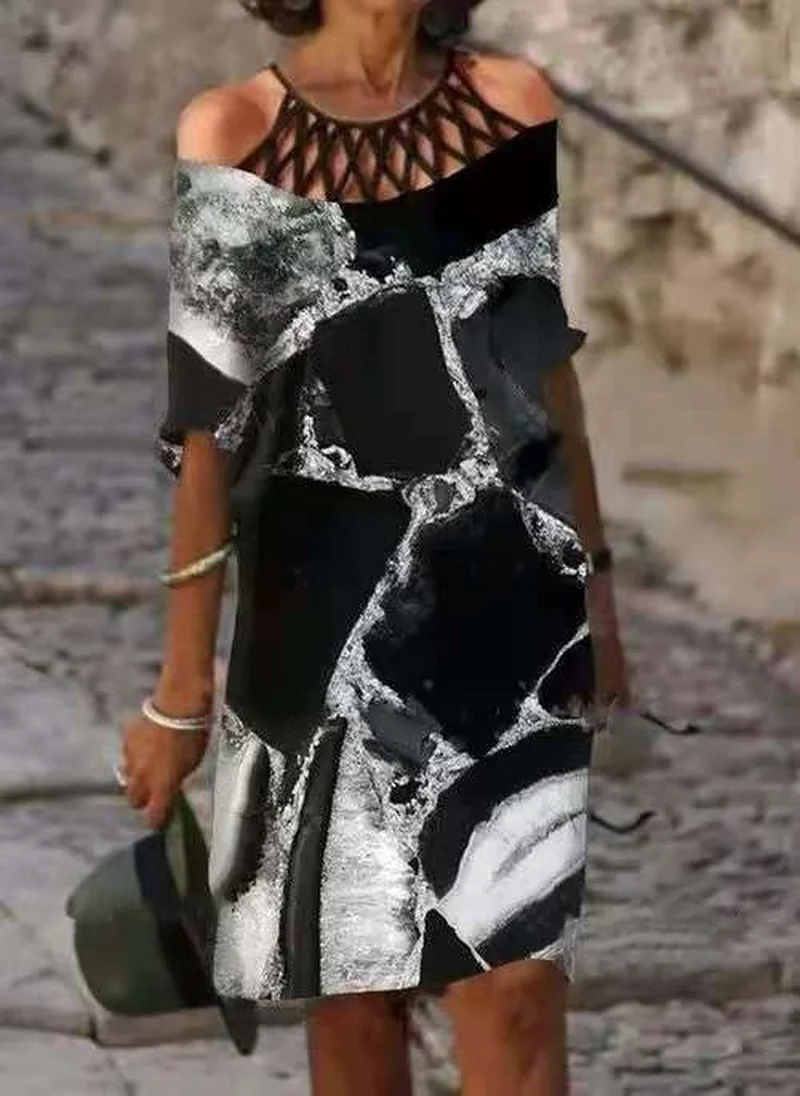 

Fashion Women's Dress New Casual Hot Sale Round Neck Pullover Printing Loose Hollow Retro Literary Short-sleeved Dress Donsignet