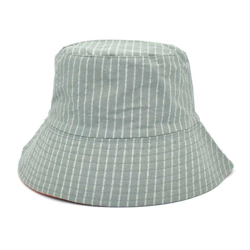 

Korean spring and autumn women's new striped fisherman's hat with double sides