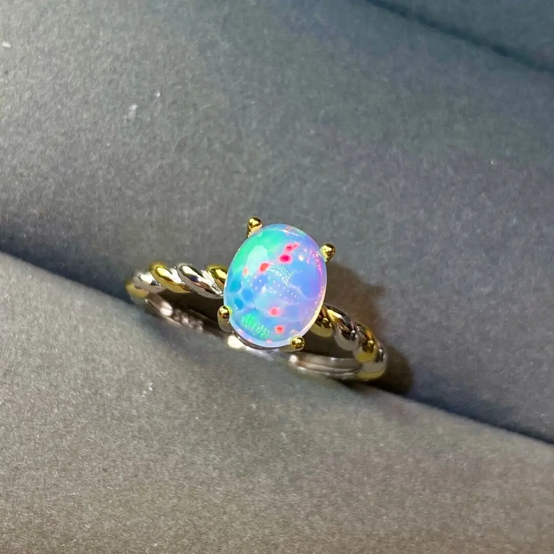 

Новый товар в магазине, рекомендовано владелицей женского кольца с натуральными опалиновыми красками цвета огня из серебра 925 пробы, регули...