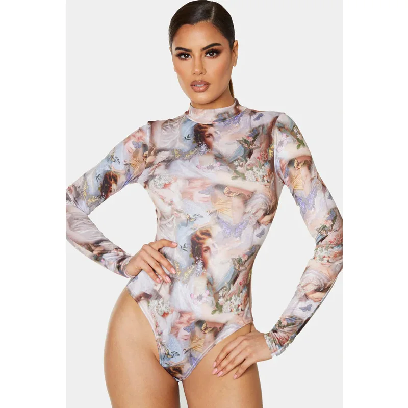 Женский пикантный комбинезон с длинным рукавом черный тонкий круглым вырезом и