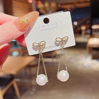 korean version of the fashion personality long bow pearl pendant earrings female temperament exquisite earrings