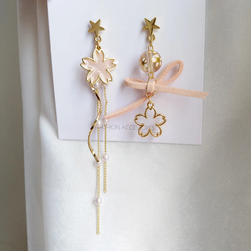 

Fashion beautiful earrings female creative asymmetric bowknot flowers pink earrings joker no ear pierced earrings