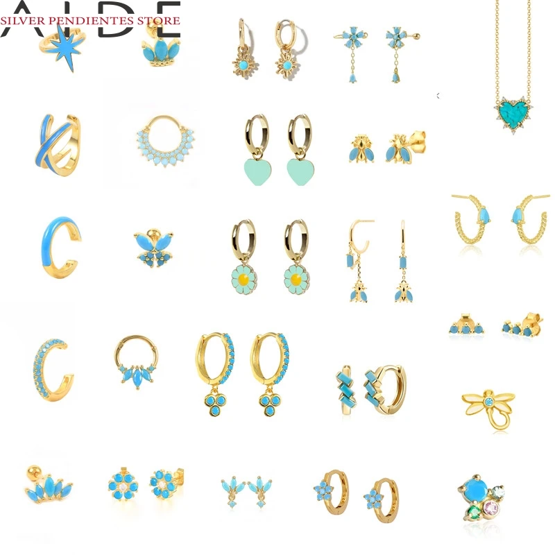 

Серьги-кольца женские из серебра 925 пробы с бирюзовым кристаллом и эмалью