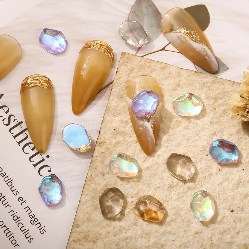 

50pcs Nail crystal ice bean Mocha transparent paradise Aurora illusion AB color plated three-dimensional irregular glass