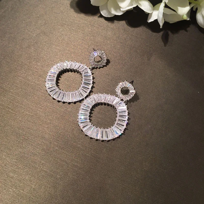

White transparent earrings micro-inlaid with irregular circle earrings concave and convex waves elegant atmospheric earrings