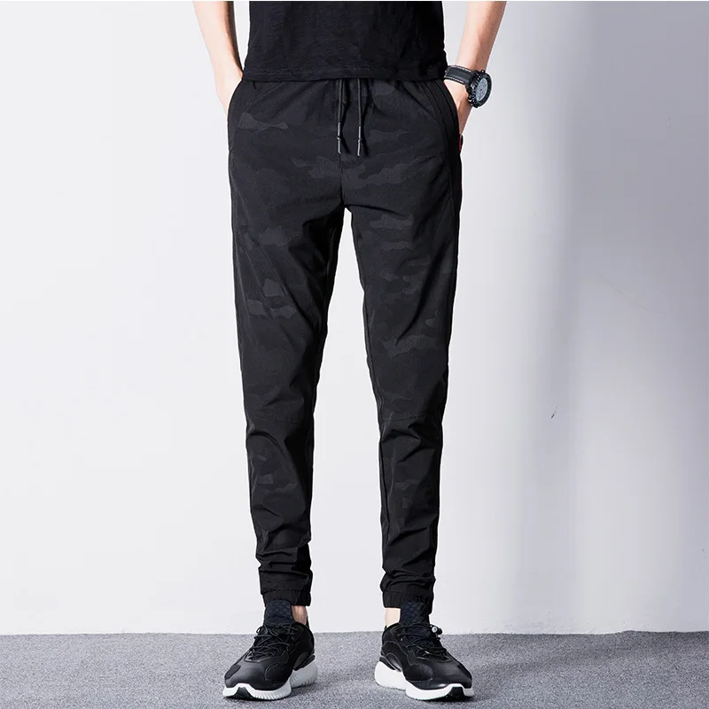 

Summer new air conditioning pants men's Korean youth sports quick dry casual pants thin fashion men's camouflage nine point