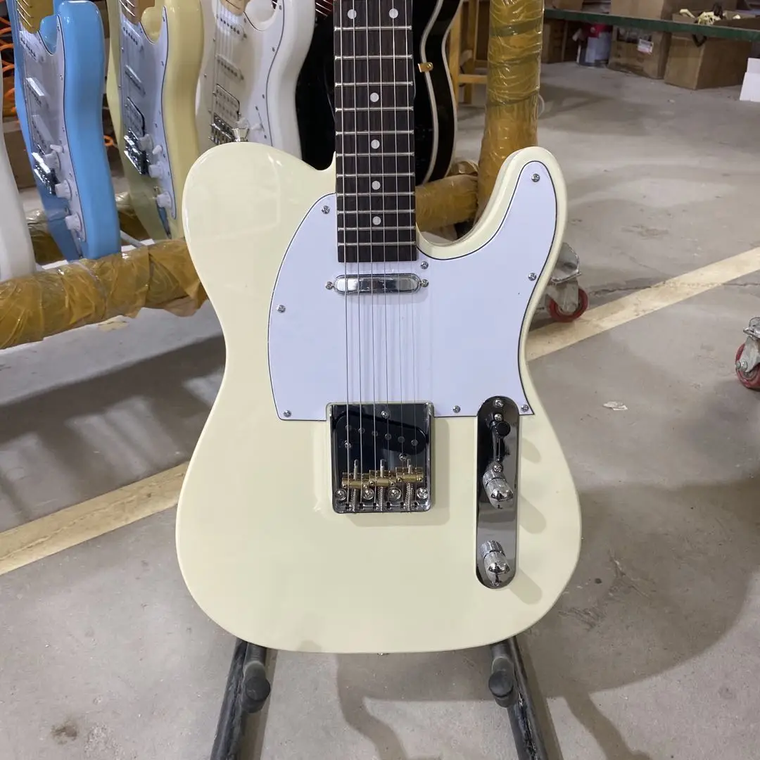 

Tele Electric Guitar Cream Yellow Color Rosewood Fingerboard Chrome Hardware White Pickguard High Quality Free Shipping