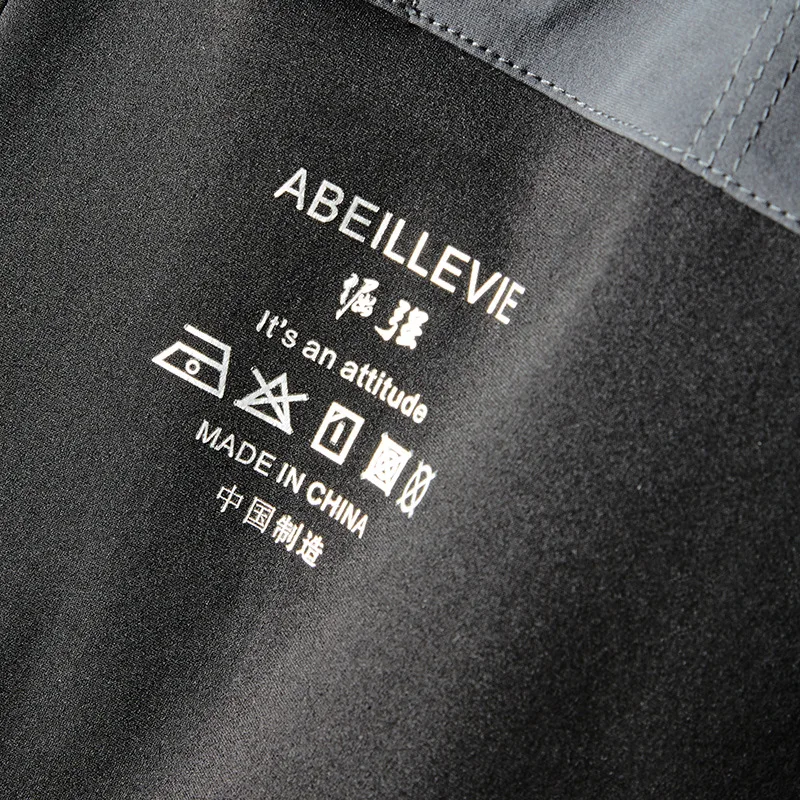 

New shorts men's Korean version of the trend of quick-drying beach pants casual slim pants stitching tooling five-point pants