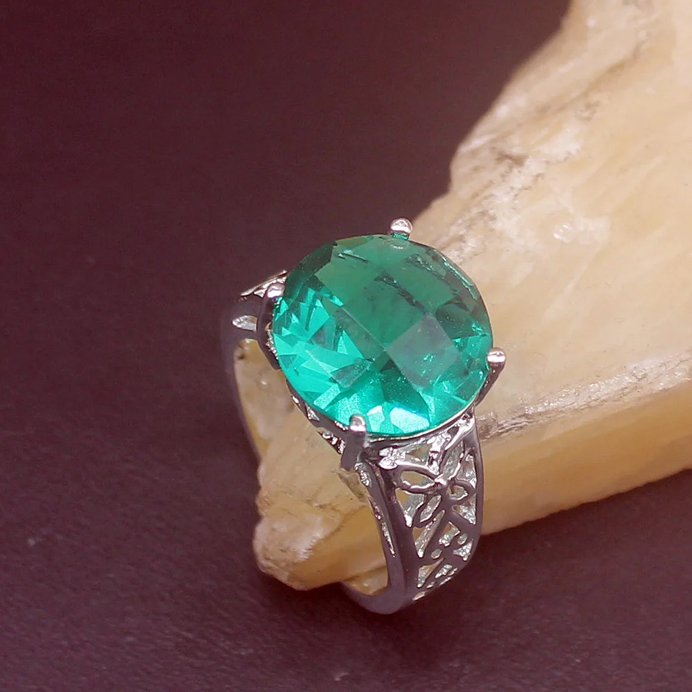 

Женское кольцо из серебра 925 пробы с зеленым топазом