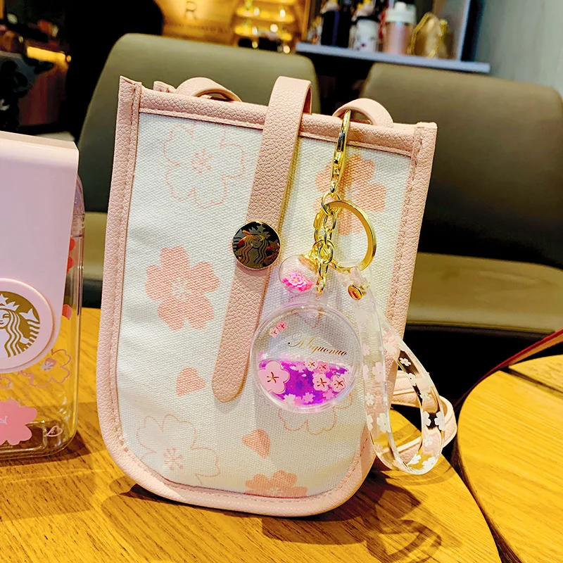 

Floating Creative cute Cherry blossoms Keychain Moving Liquid quicksand drift flower keyring for women bag pendant K111