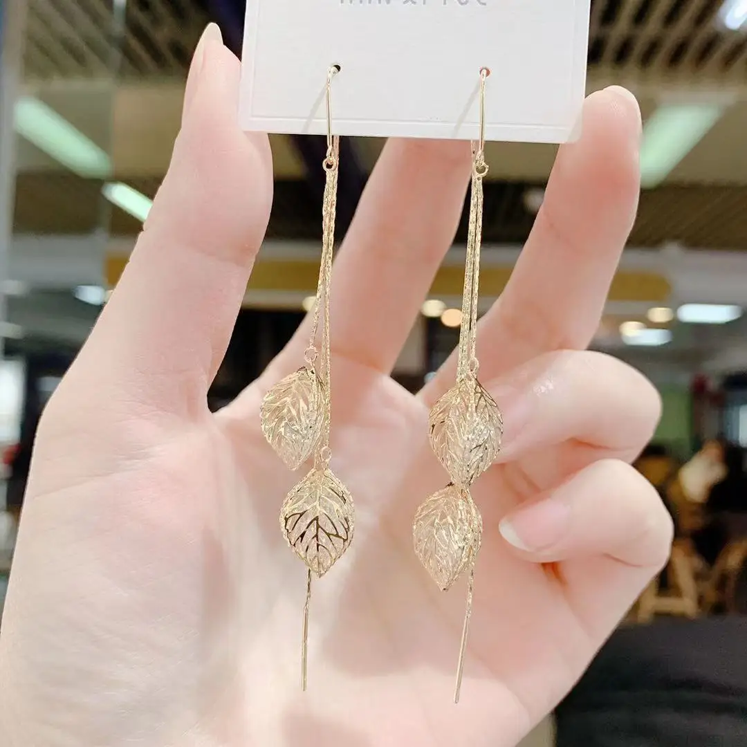 

Jewelry Geometric Hollow Leaf Tassel Earrings Long Ear Wire New Trendy Temperament Fashion Earrings
