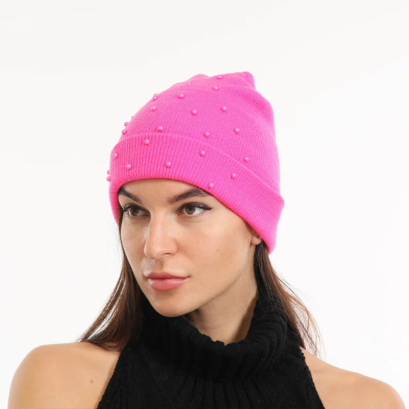 

Europe and the U.S. new pure color curl sleeve versatile fashion knitted hat warm and cold proof wool hat in autumn and winter