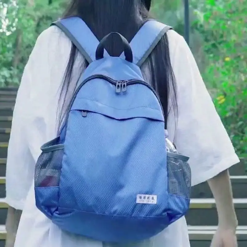 

New Waterproof Nylon Women Backpack 2021 Solid Color Casual Backpack For Teenagers Women Large Capacity Ladies Schoolbag