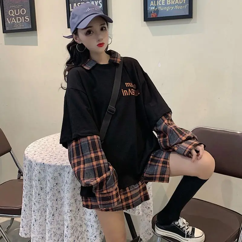 

New splicing long-sleeved fake two-piece blouse loose mid-length polo collar sweater women