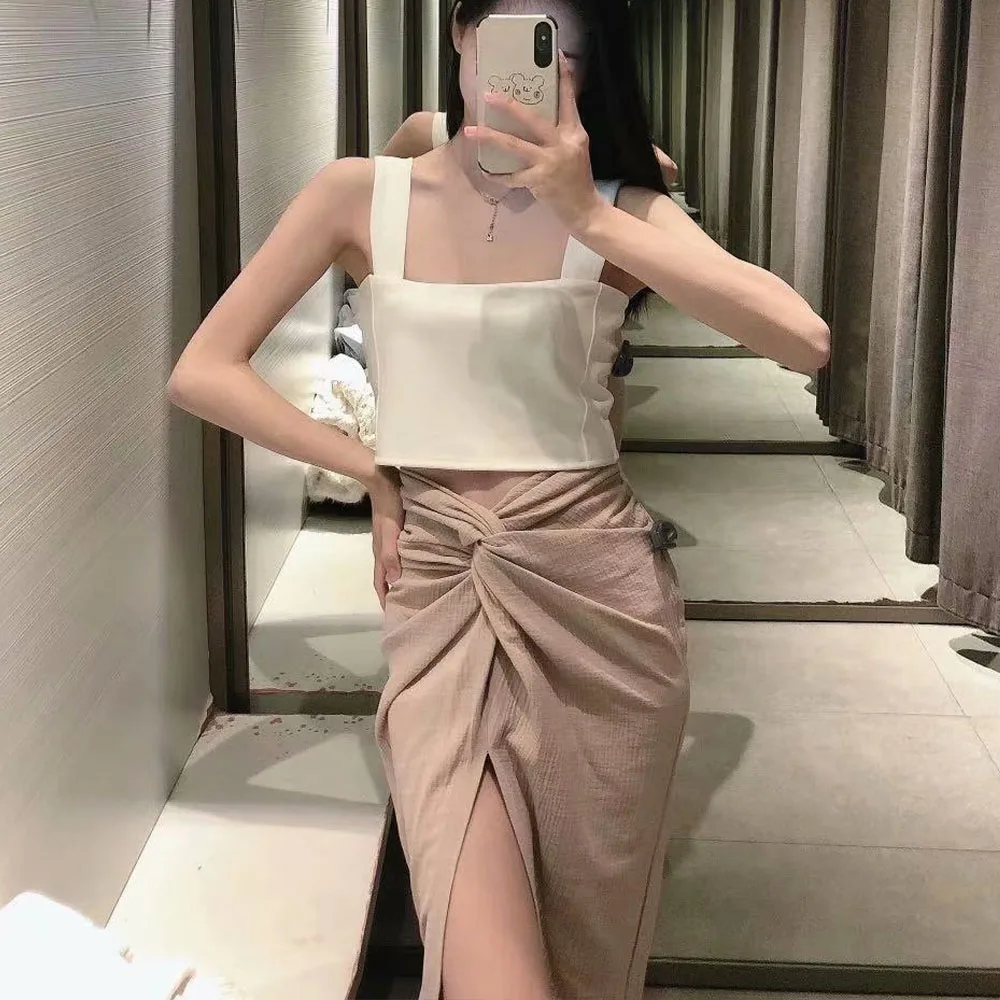 

2021 spring new women's pure color wild thin package hip slit high waist thin texture knotted midi skirt