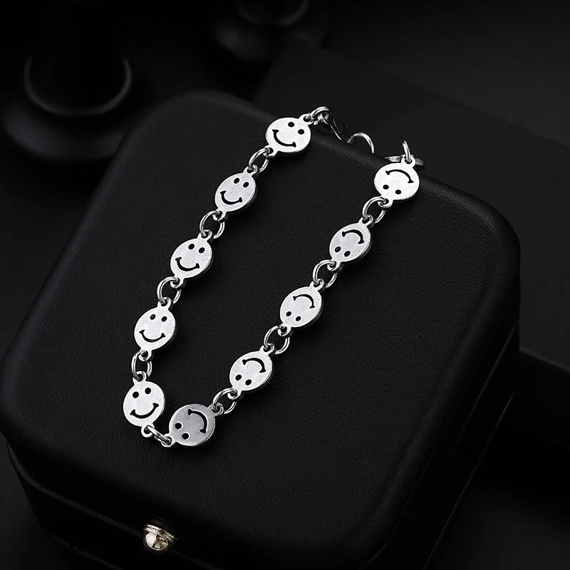 

New titanium steel expression smiley face bracelet female niche design ins tide brand hip hop punk bungee simple jewelry