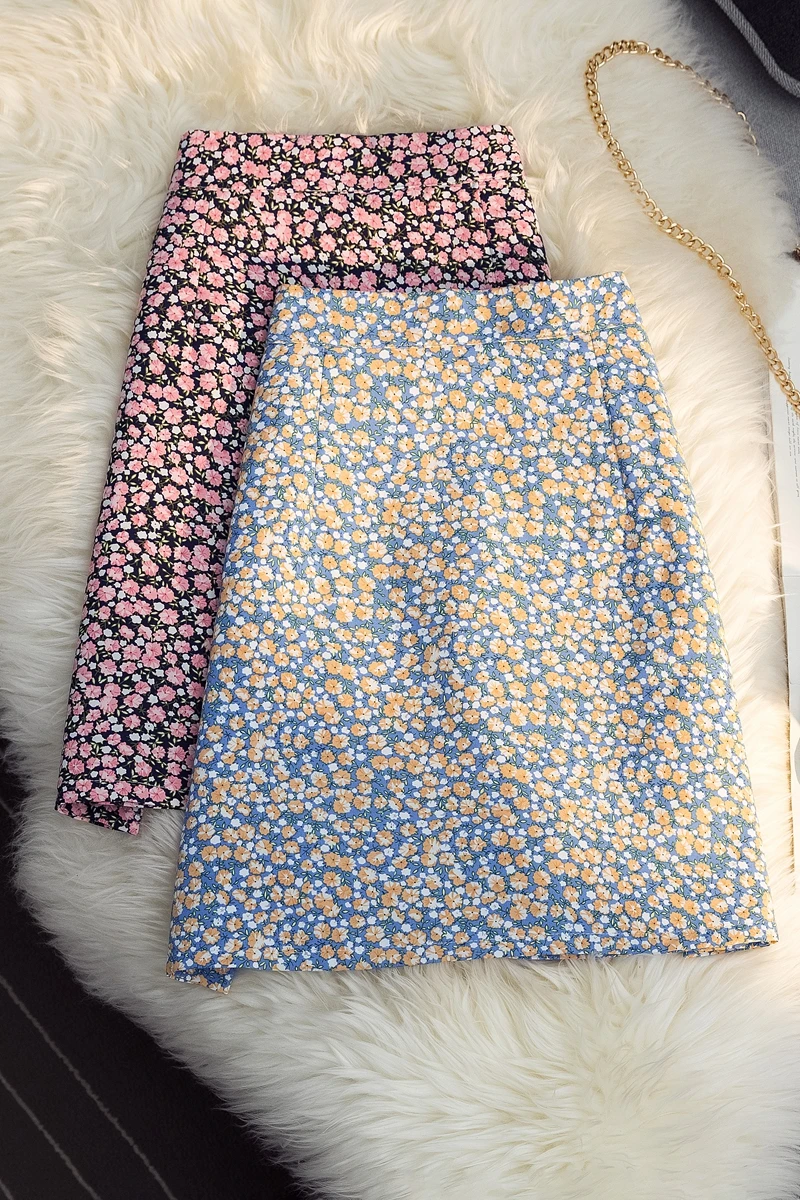 

Retro floral short skirt female spring 2021 Korean version of high waist A-line package hip skirt anti-empty bottoming skirt