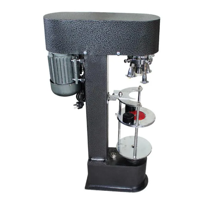 Крышка укупорка машины бутылки белого вина крышка крышки виски оливкового масла