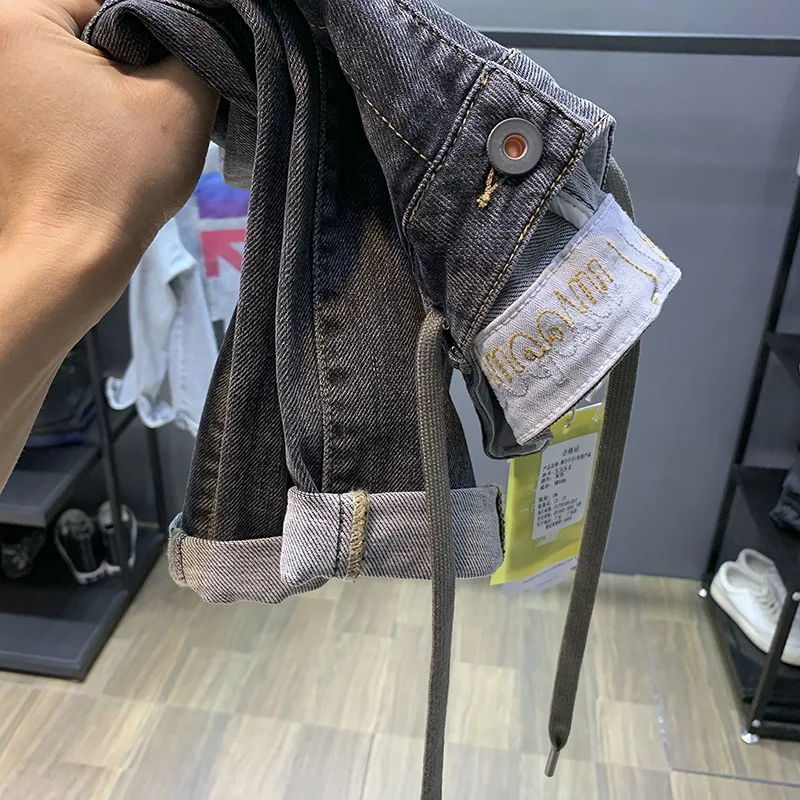 

2021 Dark gray winter thick jeans men's drawstring trendy brand small feet drawstring harem pants Korean long pencil pants men