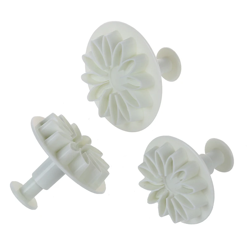 Зазубренные подсолнечника герберы и резец в форме маргаритки плунжера