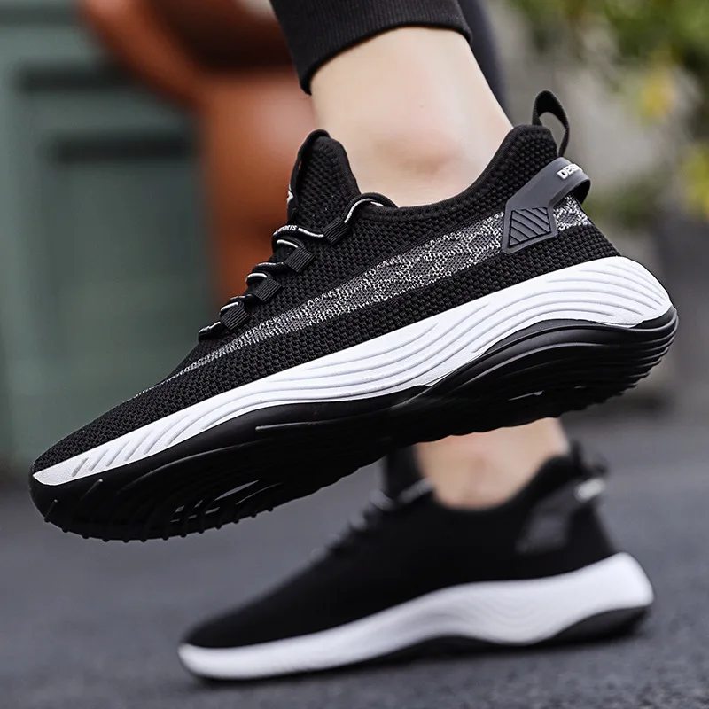 

New spring and summer trend men's shoes wild sports casual mesh couple running shoes flying woven driving shoes