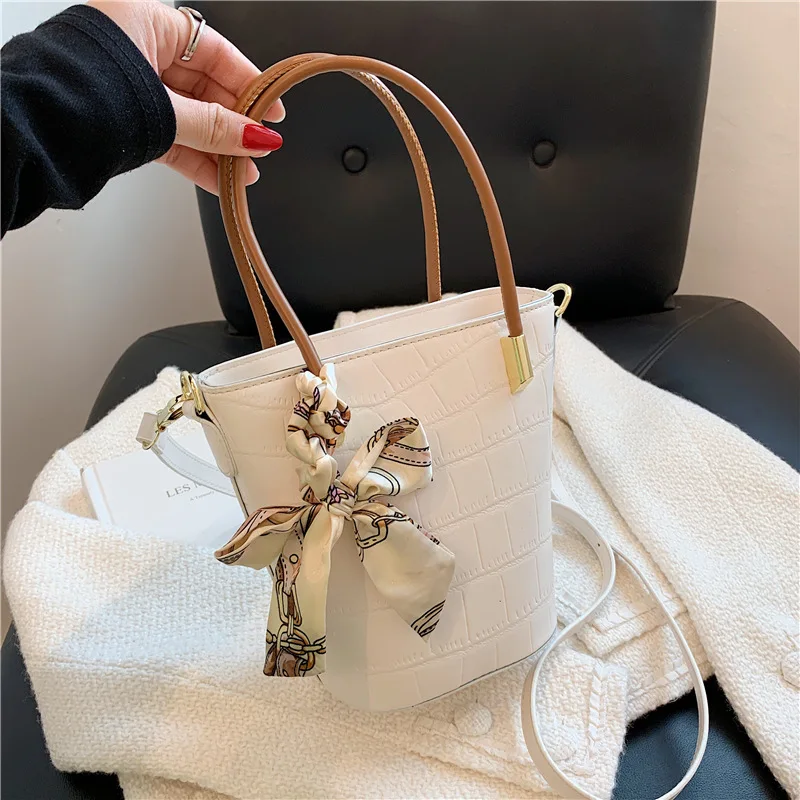 

Высококачественные дамские сумочки с каменным узором, новинка 2021, корейские женские сумки, модная вместительная сумка-мессенджер на одно п...