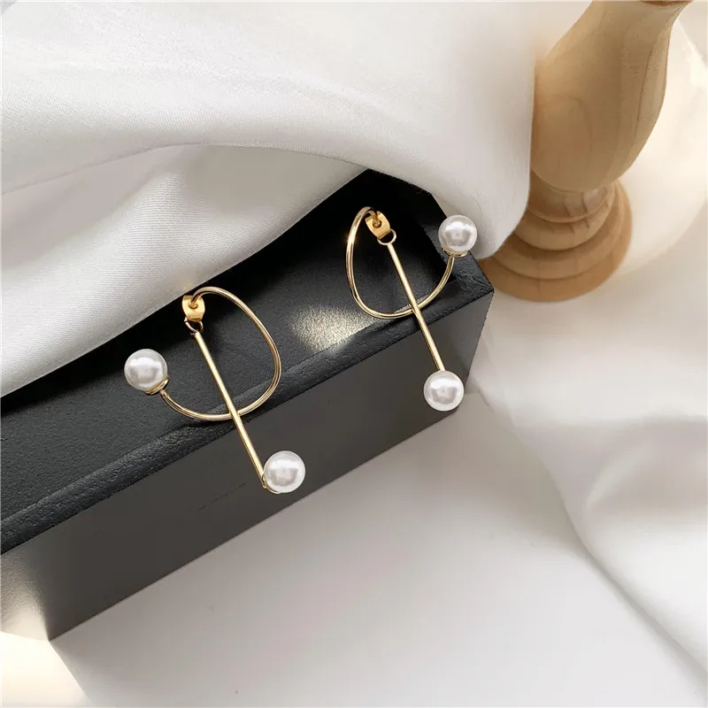 

South Korea temperament design feeling small metal winding pearl earring personality contracted earrings women jewelry