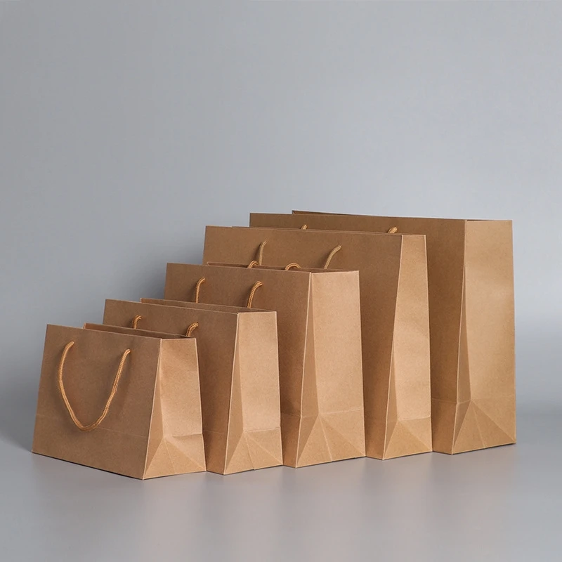 

10pcs/lot 7 size kraft paper bag with handles for Wedding Party Fashionable Jewelry clothes Packing bags Gift paper bags