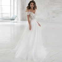 elegant a line white wedding dress 2022 long boho vintage lace tulle v neck cap sleeves bride gown with train buttons