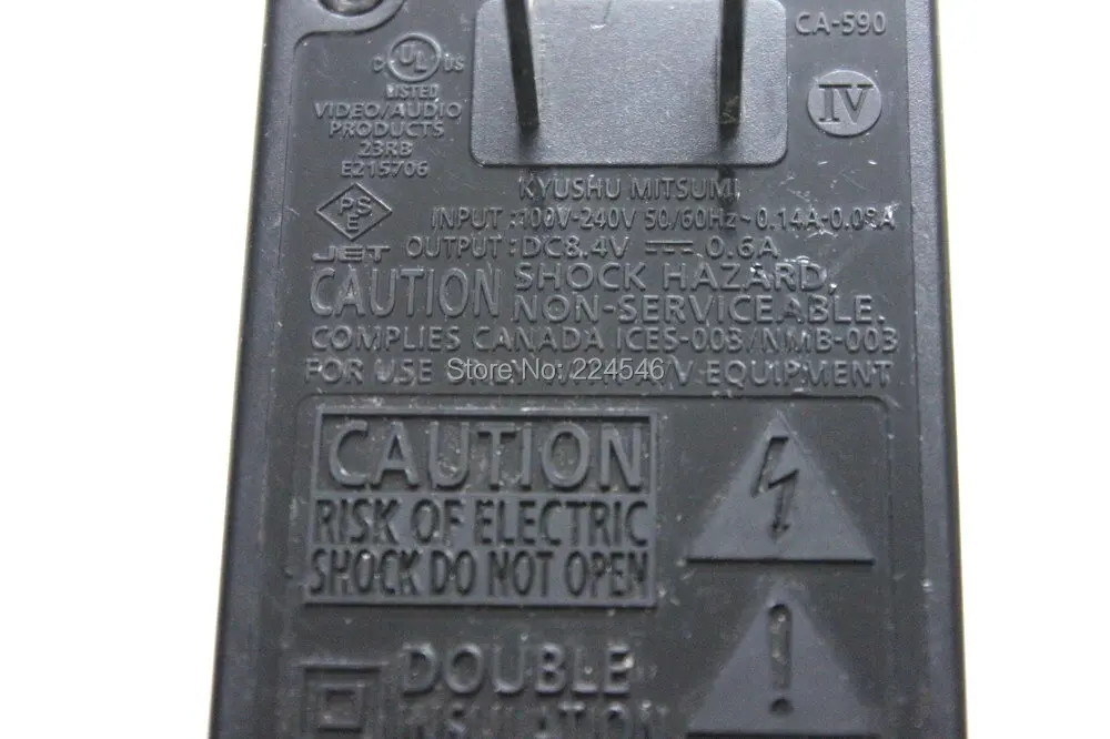 

USED Compact Power Adapter 8.4V 0.6A for Canon CA-590 FS10 FS11 FS100 Camera