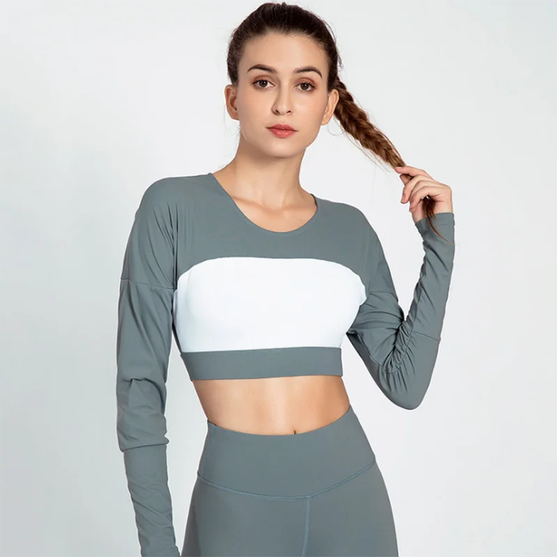 

New type hollow-out beauty back shockproof collection high elasticity fitness long sleeve yoga top with chest pad Yoga tops