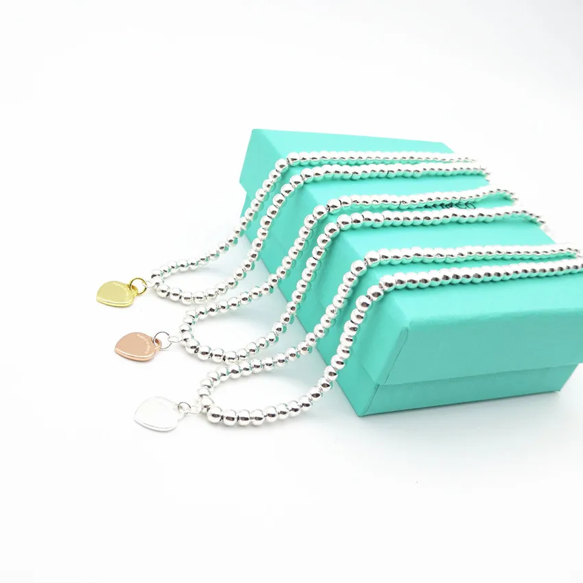 

Rose gold heart-shaped label 4 mm round bead necklace pendant heart-shaped necklace