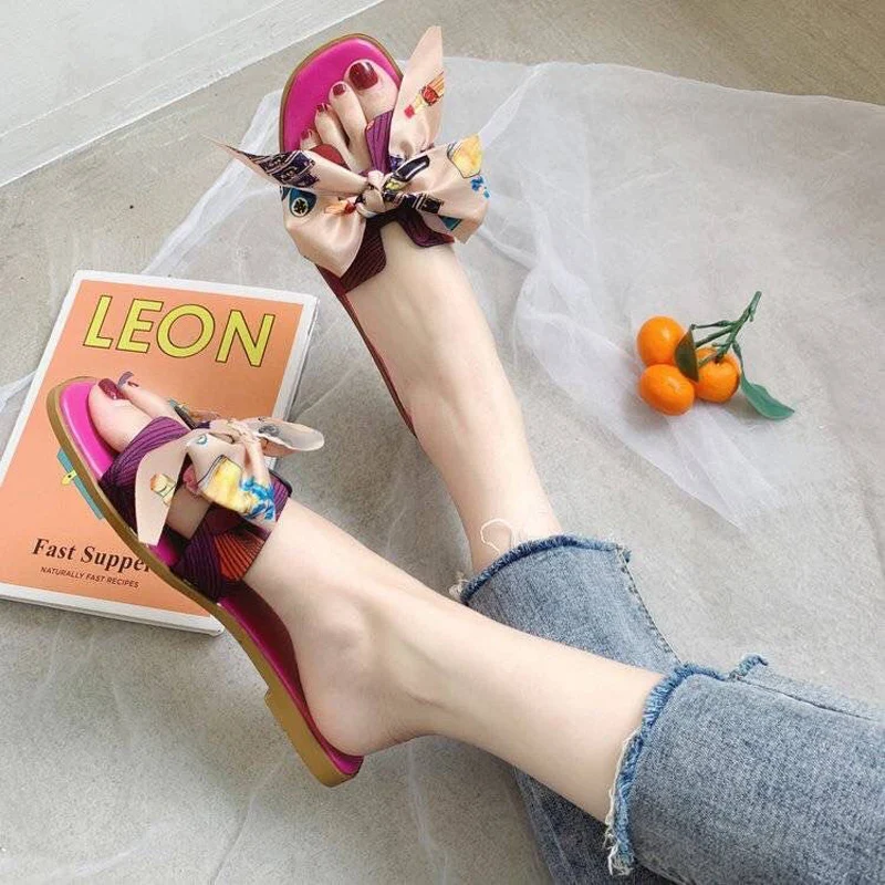 Сланцы женские пляжные шлепанцы на плоской подошве с большим бантом модные