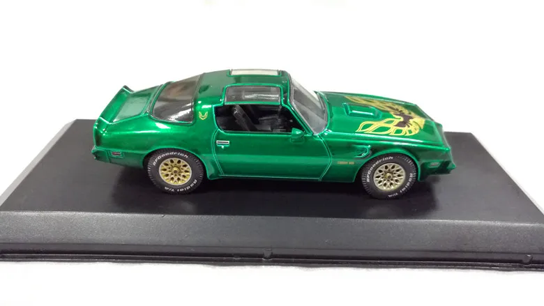 Автомобиль GreenLight 1:43 1977 PON TIAC FIREBIRD T/A boutique из сплава игрушки для детей детские