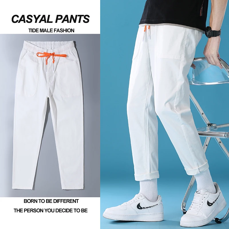 

2021 brand new young men's pure color loose casual pants stretch sports pants fashion trend Harlan calf denim cropped trousers