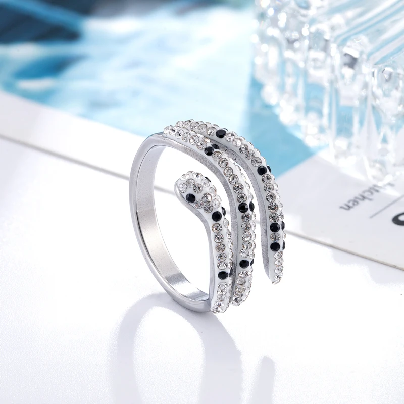 

Модное Новое черно-белое кольцо из нержавеющей стали со змеиным кристаллом для женщин, подарок, брендовая бижутерия золотого цвета, кольцо, ...