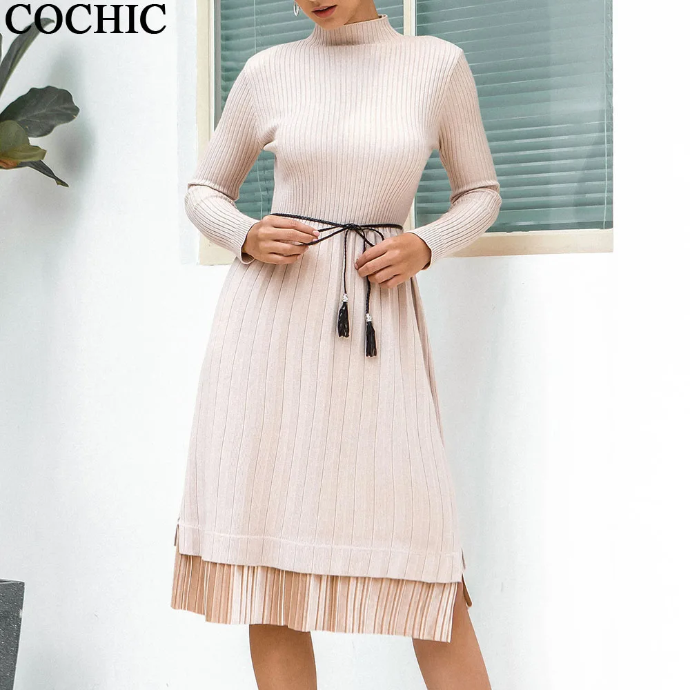 Осенне зимнее удлиненное платье свитер средней длины с воротником хомут